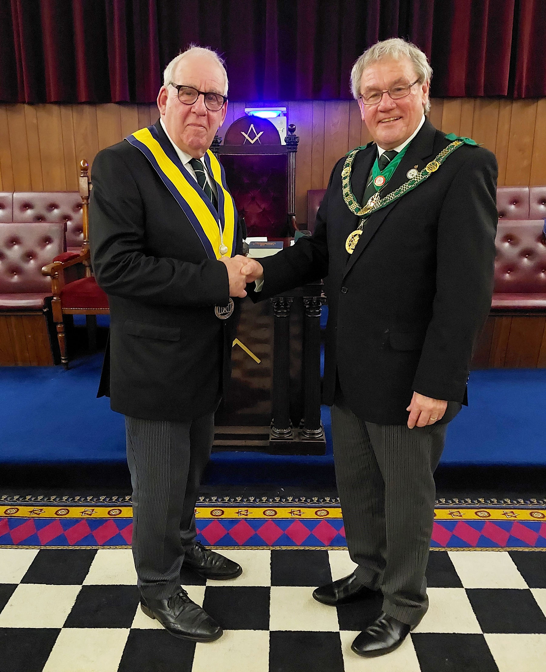 The D.G.P. congratulates Bro. Reg Pritchard on receiving his Grand Council Certificate