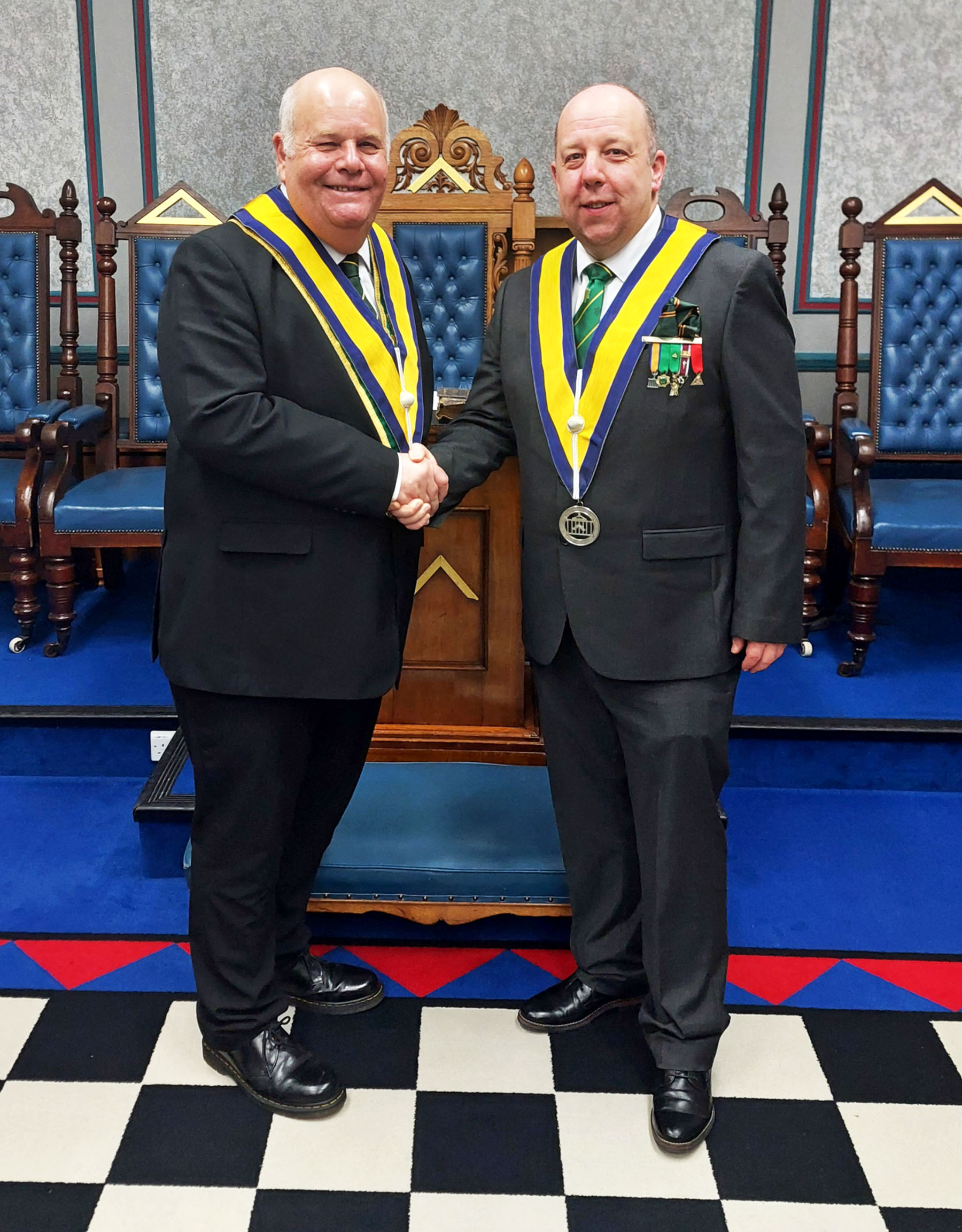 The Worshipful Master W.Bro. Lee Curtis is congratulated by the Installing Master W.Bro. Phil Clare