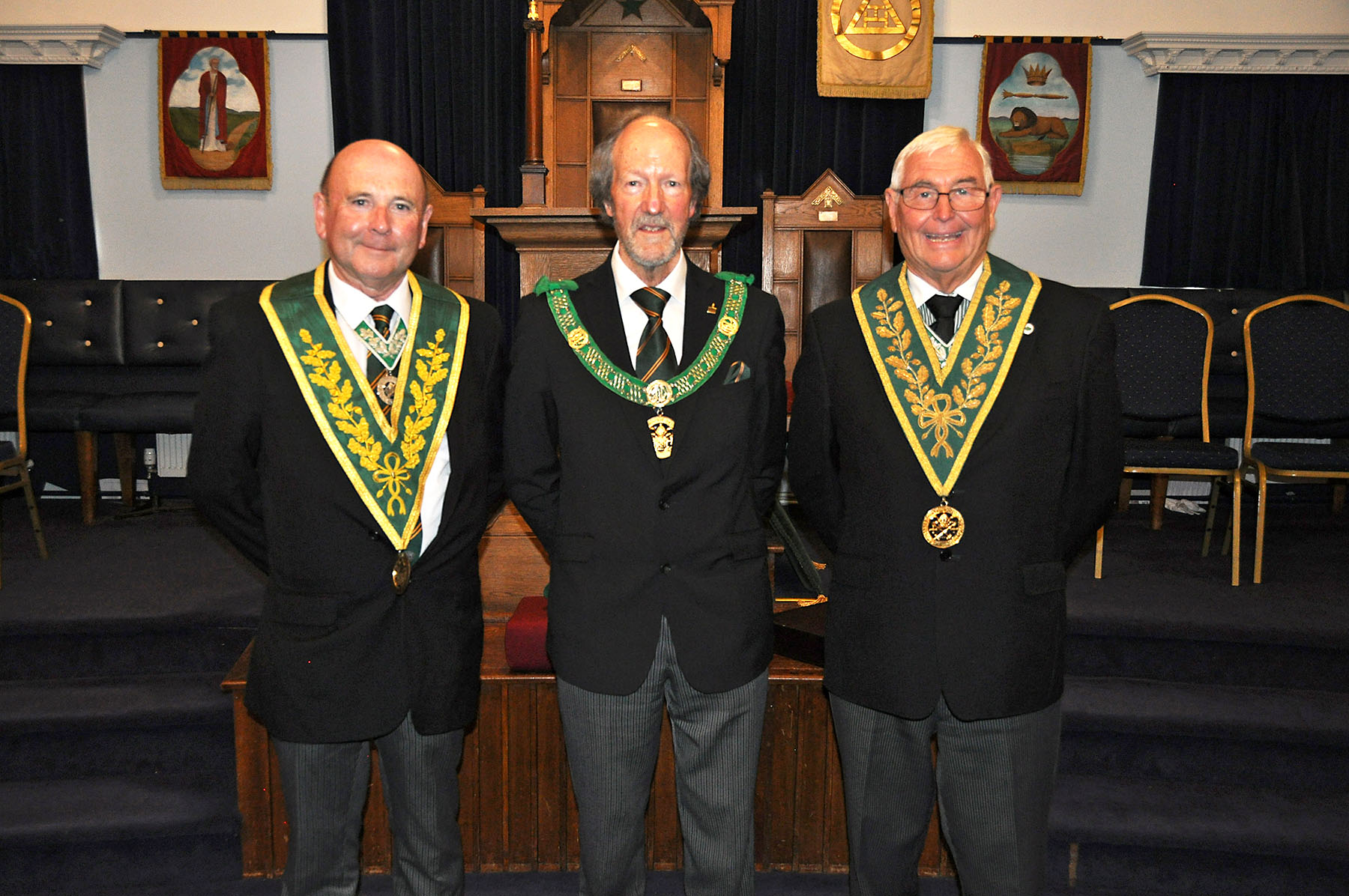 The D.G.P. R.W.Bro Barry Slade and his Deputy W.Bro. Clive Penraze with W.Bro. Geoff Whale Dep D.G.P.
