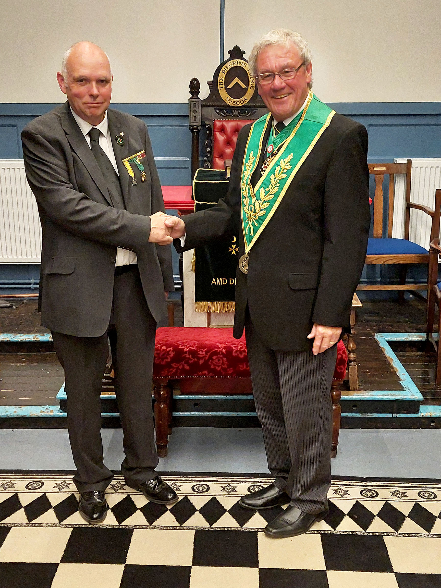 Bro. Gavin Crickett is welcomed into the Order by the District Grand Prefect R.W.Bro. Brian Ward