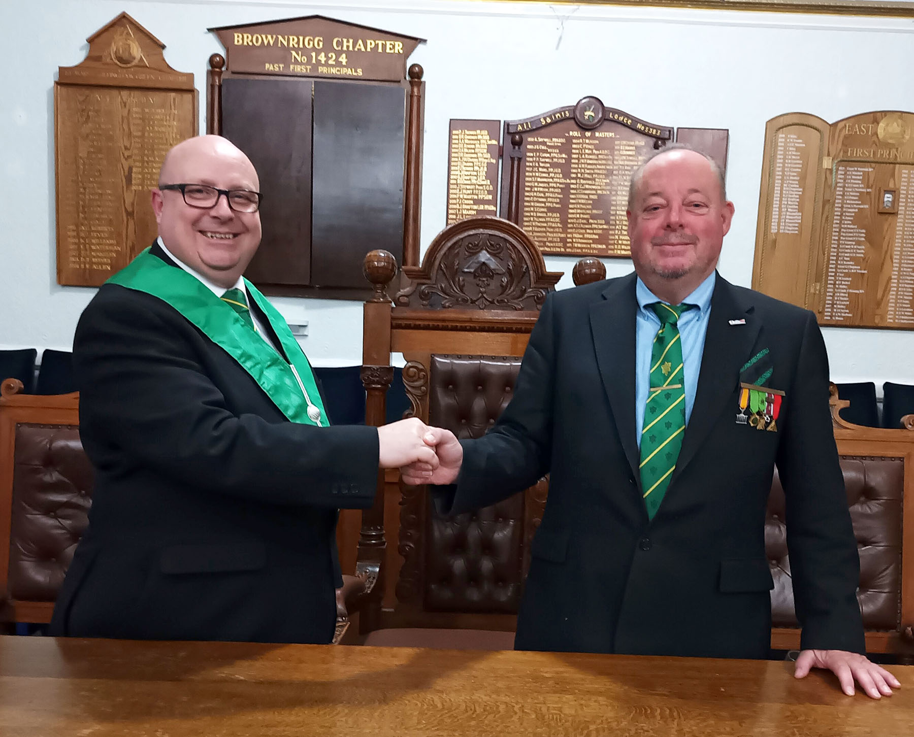 The Installing Master W.Bro. Bill Pennell congratulates the new Master W.Bro. Christian Doll