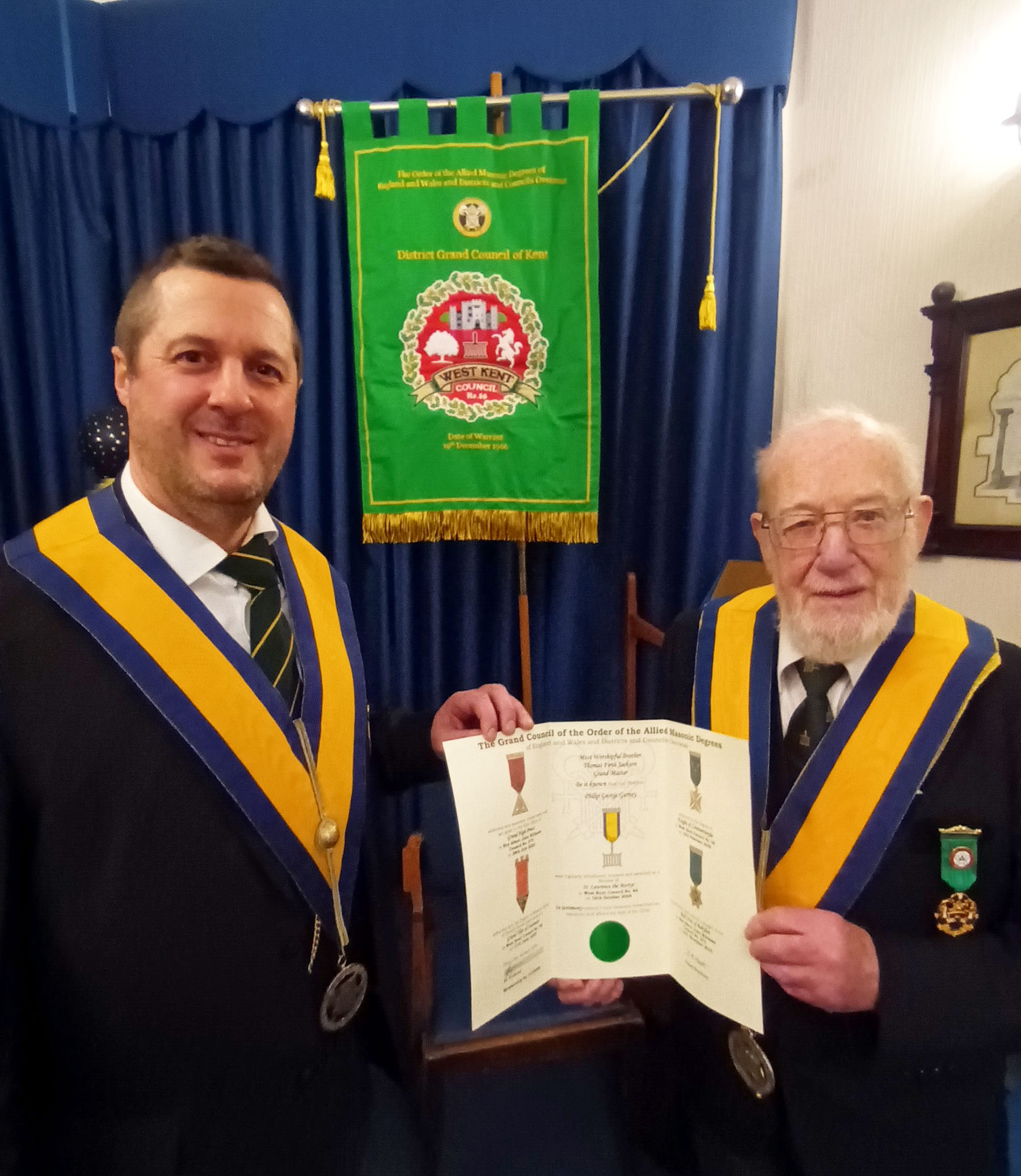 R.W.Bro. David Viggers presents a Grand Council certificate to Bro. Paul Gurney