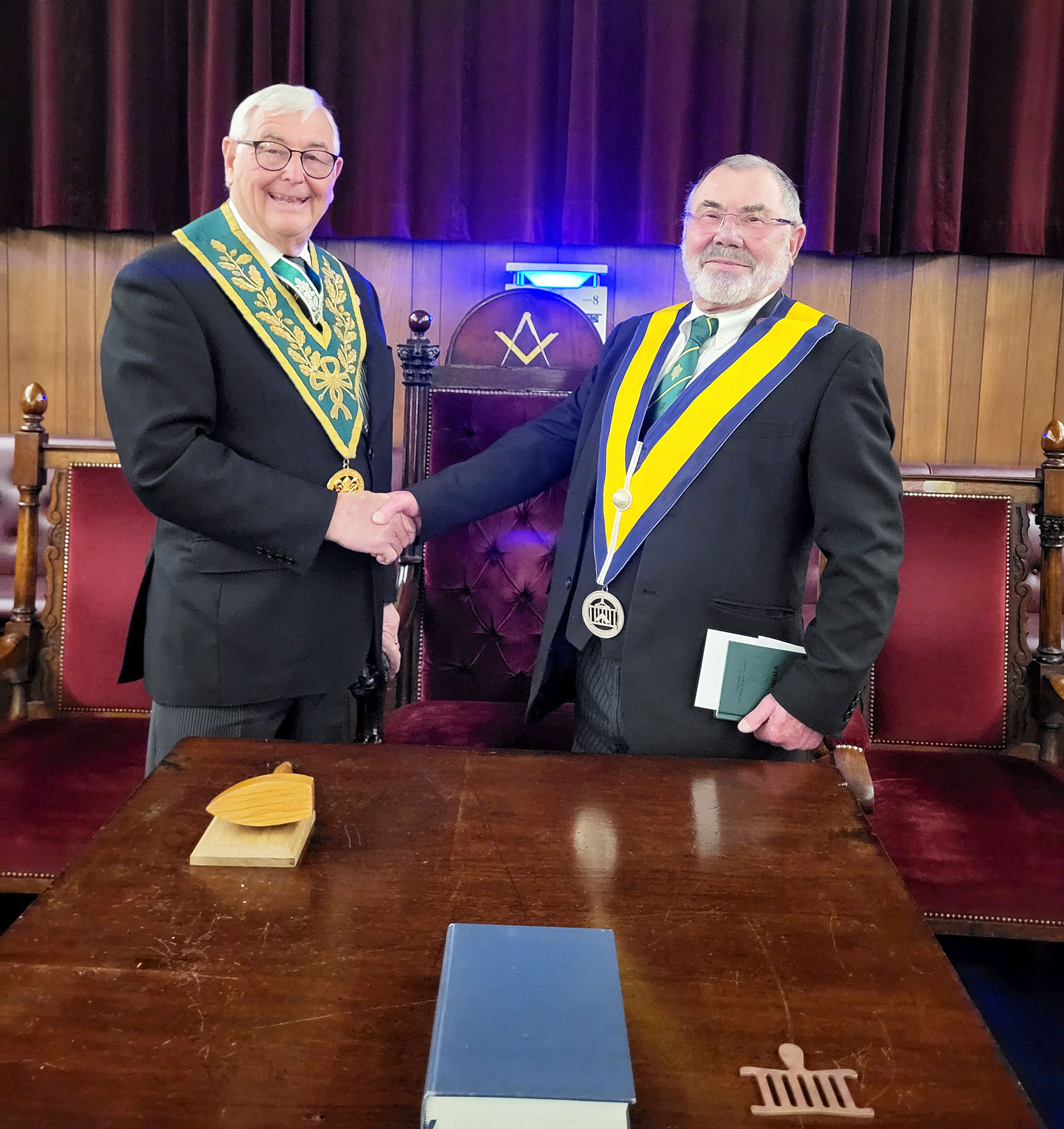 Deputy District Grand Prefect Congratulating Keith Wildey